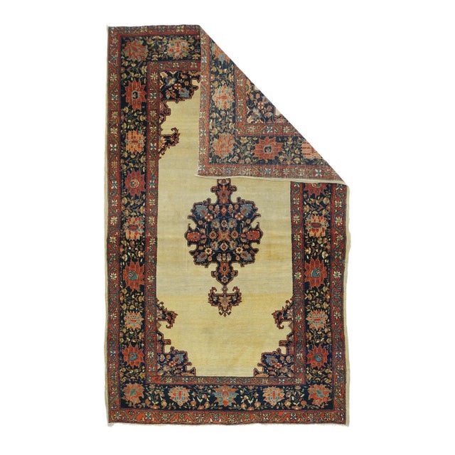 This scatter is one of the most desirable of Farahan-Sarouk types with its contrast of a very subtly abrashed open sandy-...