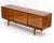Elegant and elongated, this "Hamilton" style sideboard is expertly crafted from rich French mahogany and showcases the...