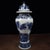 Stately Chinese chinoiserie porcelain Ginger Jar with fitted domed lid. The body is hand‑decorated in classic cobalt blue...