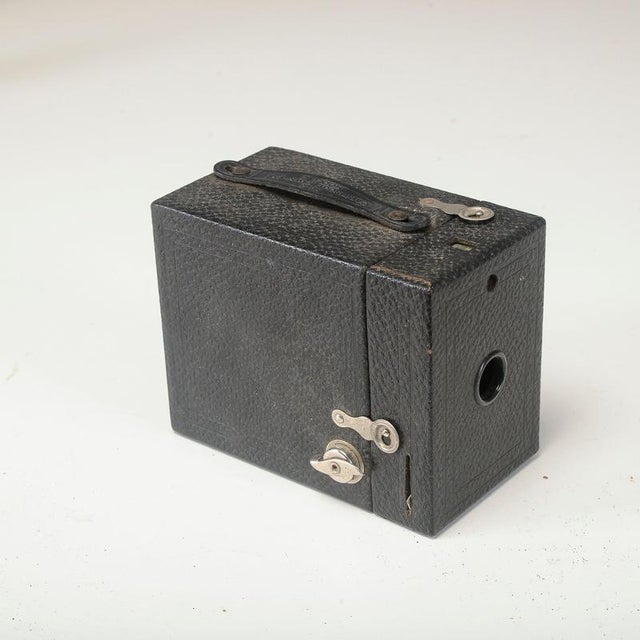 This No. 2 Cartridge Hawk-Eye Model C camera, manufactured by Kodak in the early decades of the 20th century, is a...