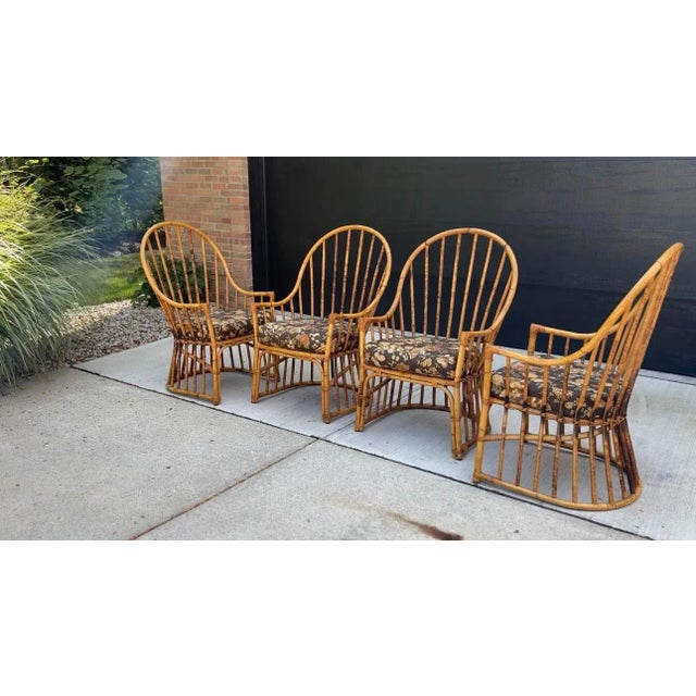 Grand in scale at almost 4' tall, these beautiful peacock chairs could serve as a focal point at your dining table; or use...