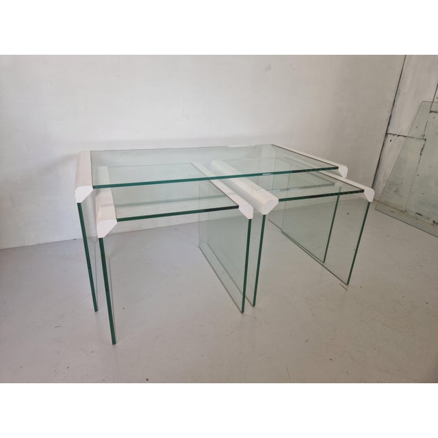 Beautiful set in white rvs with thick glass. This piece has an attribution mark, I am sure that it is completely authentic...