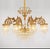 A grand palace-style chandelier crafted for dramatic luxury interiors. This statement lighting piece features an ornate...