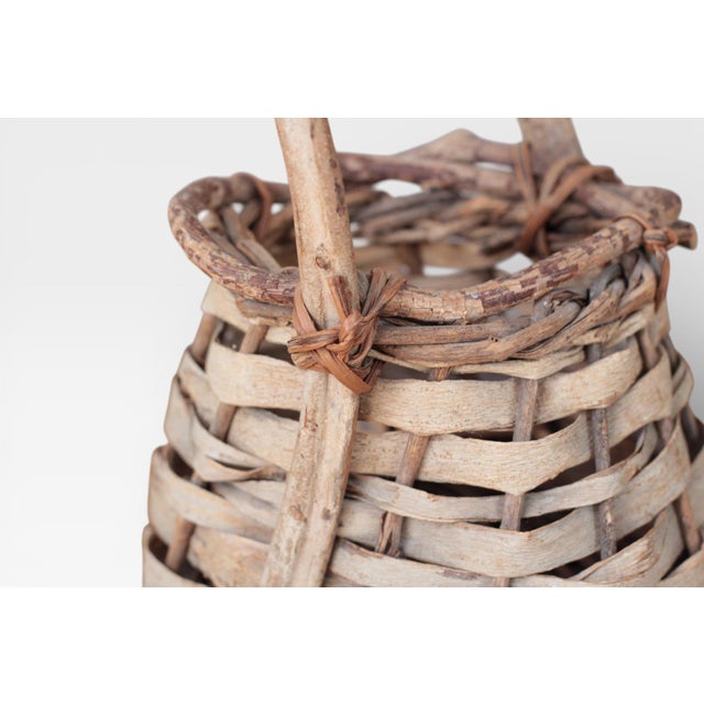 Early 20th Century Handwoven Primitive Basket With Handle For Sale - Image 9 of 11