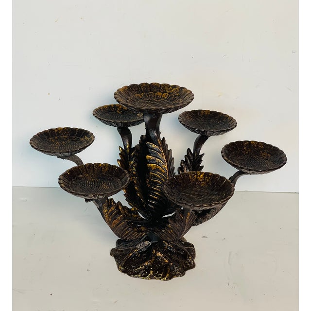 Heavy bronze artichoke style 7 arm centrepiece or candelabra with gold wash.