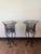 Offered for your consideration, a pair of Hollywood Regency wrought iron planter stands with wire work baskets. Large and...