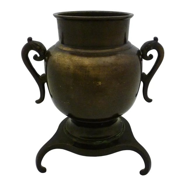 A 19th century Japanese Meiji period bronze Censer with silver floral inlay decoration. The bronze has a rich brown...
