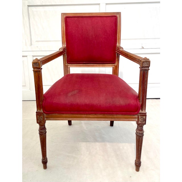 Here is a stunning carved wood armchair in the French Empire, Louis XVI style. The chair has a beautiful shape - notice...