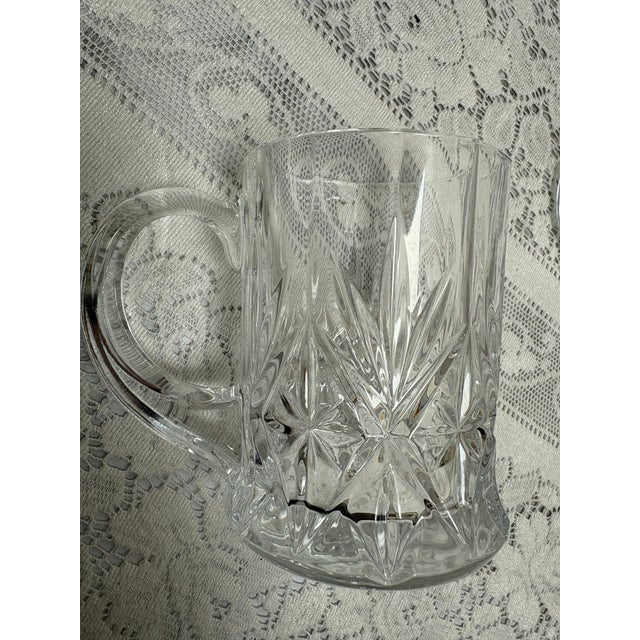 Vintage textured etched glass mugs, set of four with starburst patterns and handles. Set of four.