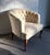1950s-60s cream brush-print tufted barrel chair w/ carved wood legs. Some minor fading on armrest portion of chair as...