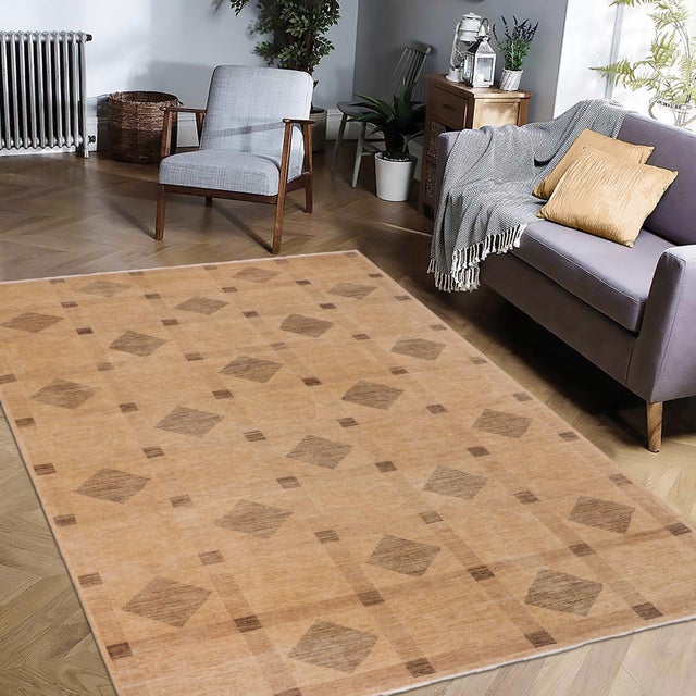 Transform your home's interior with a stunning hand-knotted Gabbeh rug. These rugs are meticulously crafted with bold...