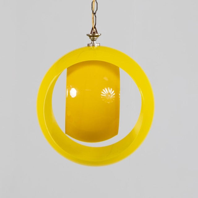 Yellow pendant lamp made of Murano glass, designed by Carlo Nason for Mazzega in the 1960s. The lamp consists of two glass...