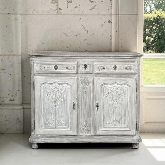 18th Century Country French Whitewashed Buffet was designed to serve a typically large family, and provide adequate...