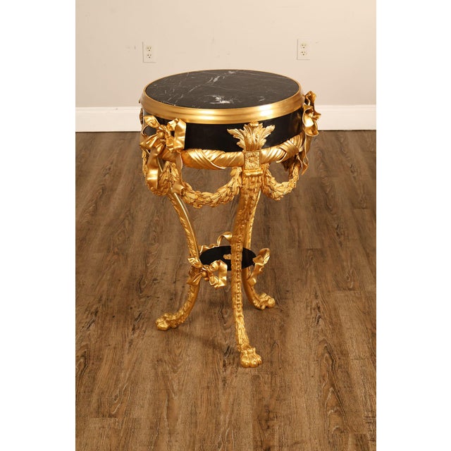 Fine Quality French Made Louis XVI Style Gueridon Table Featuring Cast Bronze Construction With Black Marble Top....