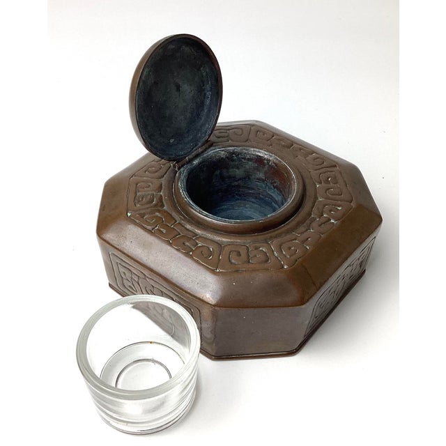 Tiffany Studios New York Zodiac Bronze Inkwell With glass insert. Clearly marked on the bottom Tiffany Studios, New York,...