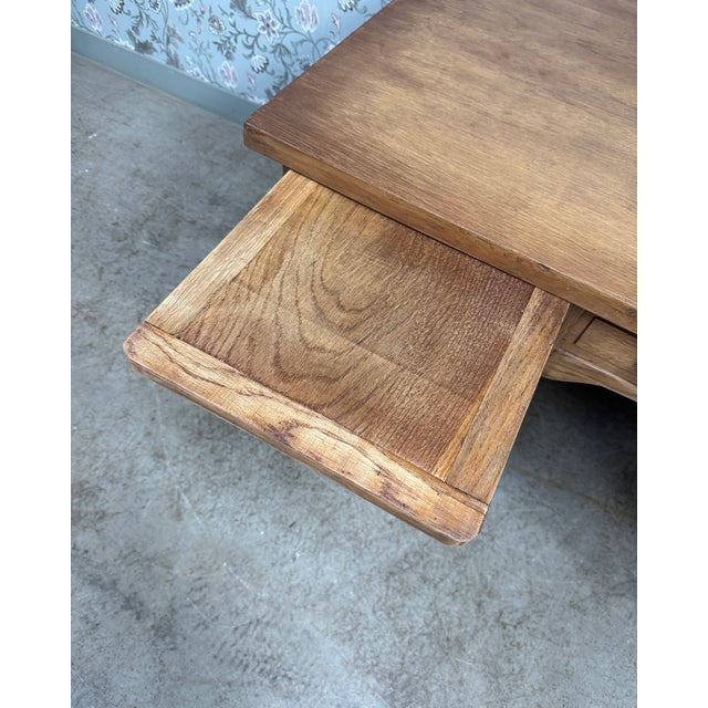 Large oak ministerial desk dating from the 1930s. With its clean, architectural lines and numerous drawers, it is...