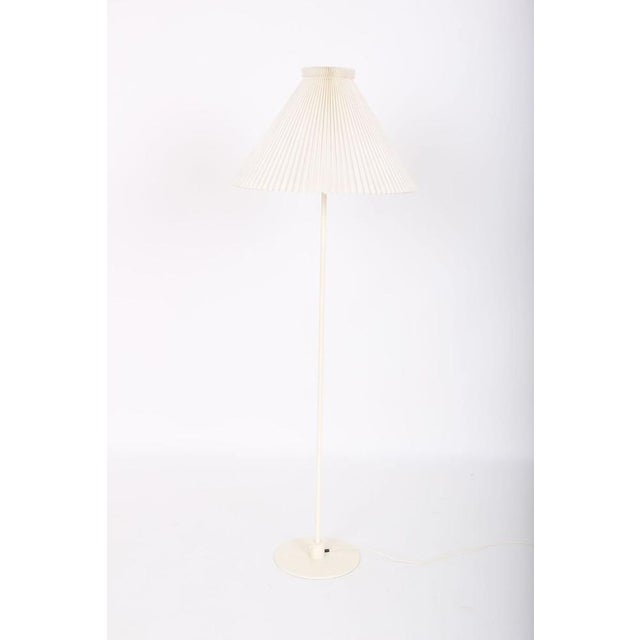 Le Klint floor lamp model 369. white lamp with white pleated acrylic shade. Note the signs of use and patina on the frames...