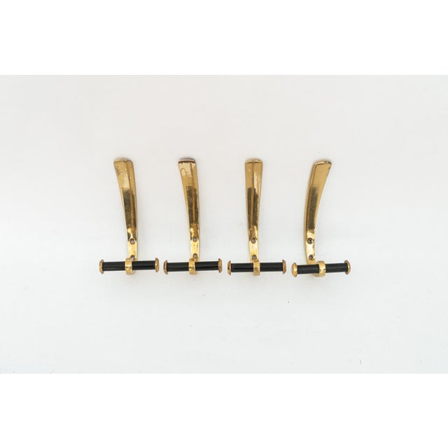 Partly black painted and brass. Excellent original condition.