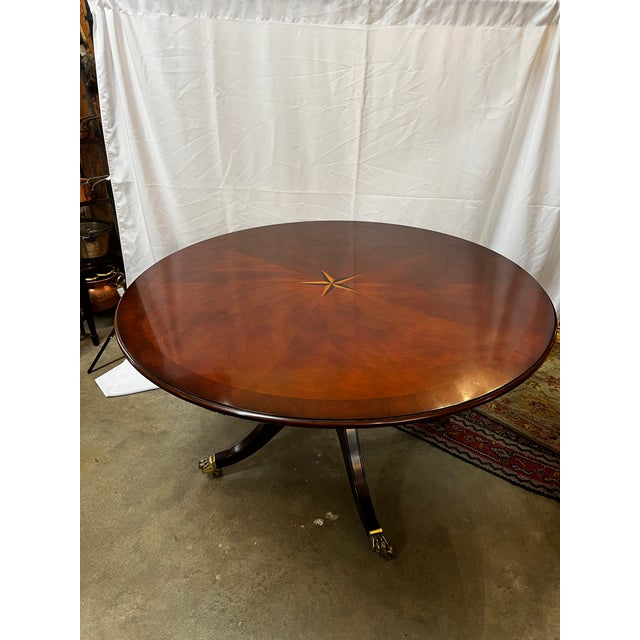 Mahogany Regency Round Dining Table With 5 Curved Outside Leaves & Brass Paw Feet For Sale - Image 11 of 13