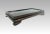 A rare antique heavy hardwood rectangular display stand on small Ming style feet. Rich dark brown in colour, this piece is...