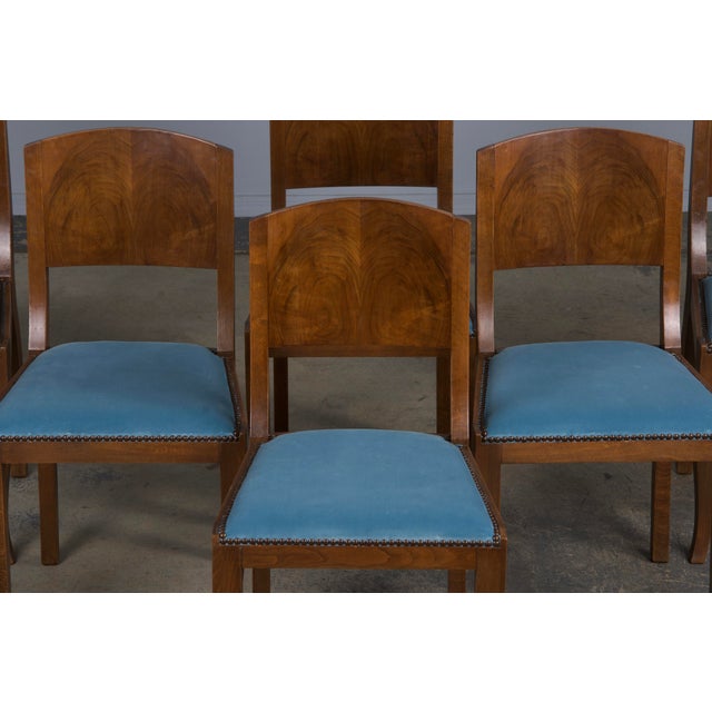 An elegant set of six 1950s French Art Deco dining chairs, thoughtfully sourced from Provence, France. Expertly hand-...