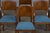 An elegant set of six 1950s French Art Deco dining chairs, thoughtfully sourced from Provence, France. Expertly hand-...