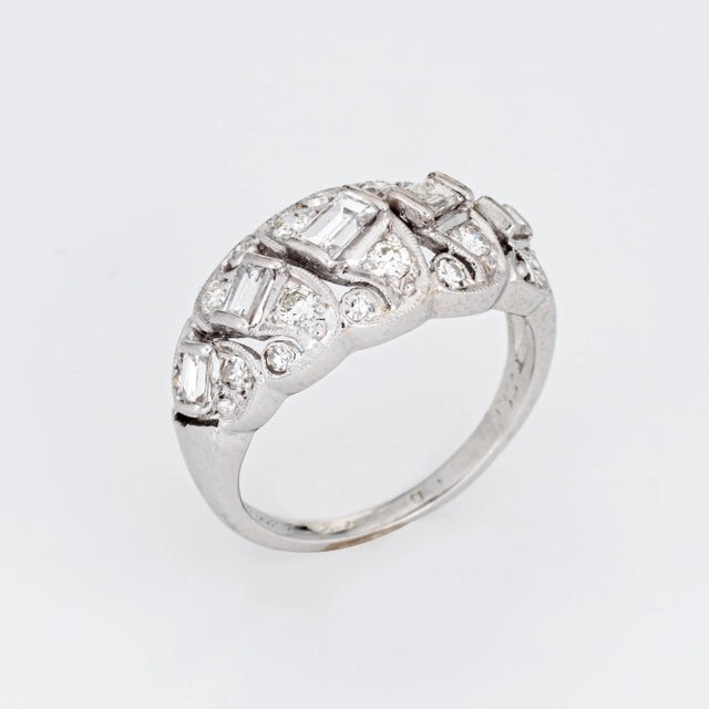 This is part of Chairish’s Fine Jewelry assortment. Stylish vintage diamond anniversary band crafted in platinum (circa...