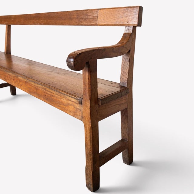 Impressive 19th century French provincial oak bench with an exceptionally long 117-inch profile and beautifully aged...