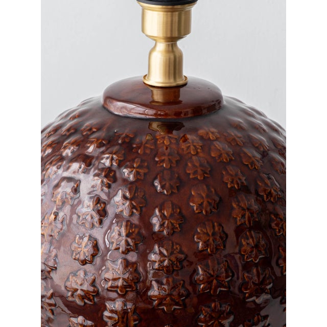 Mid-century Spanish ceramic table lamp from Manises, Valencia — a large glazed ball base in all-over embossed botanical...