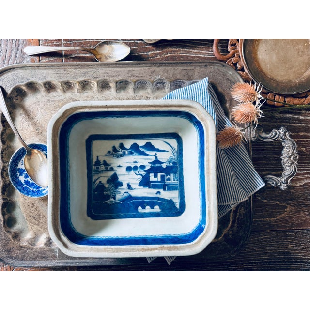 Beautiful antique Chinese blue-and-white porcelain serving dish featuring a traditional hand-painted landscape with...