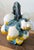 A striking vintage Italian majolica ceramic pitcher crafted in the form of an overflowing basket of lemons, richly...
