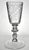 An impressive hand blown and hand engraved 18th century goblet, having a stunning stem made of several separately fused...