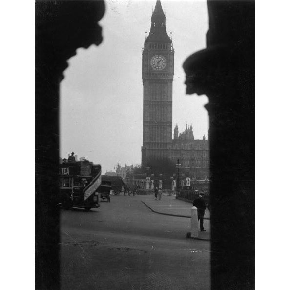 Big Ben circa 1922: Big Ben and the Houses of Parliament viewed through an archway in Westminster, London. (Photo by...