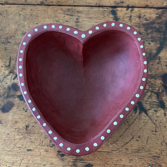 Handmade, painted red wooden bowl with white dot edge. Signed and dated on the bottom.