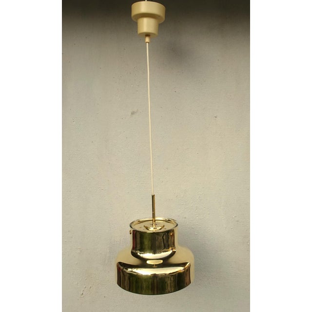 Brass Bumling Lamp by Anders Pehrson for Ateljé Lyktan, 1960s, in Good conditions. Designed 1960 to 1969 This piece has an...