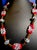 This Venetian millefiori necklace features handcrafted glass beads, 26 inches long, with sterling silver toggle clasp. The...