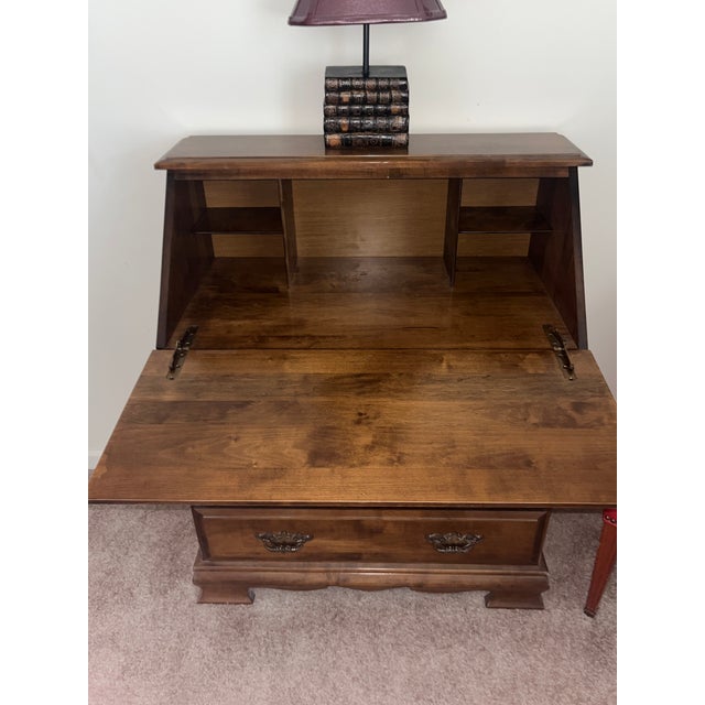 Bring warmth, character, and compact productivity to your workspace with this beautiful vintage 1970s–1980s Traditional...