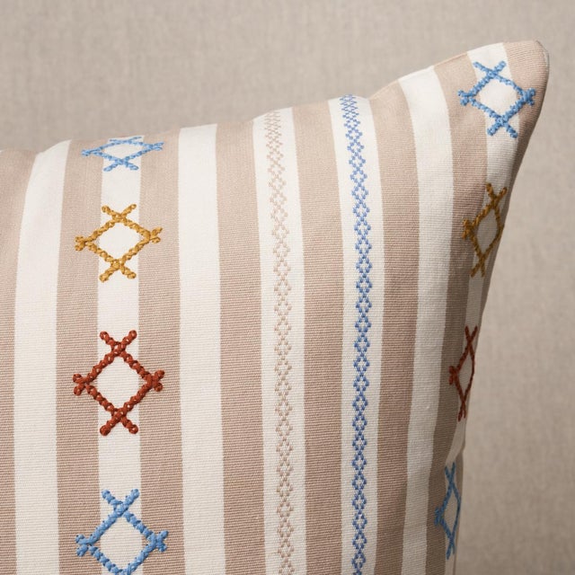 This pillow features Rhodes Stripe with a knife edge finish. Inspired by Ukrainian needlework, Rhodes Stripe is a woven...