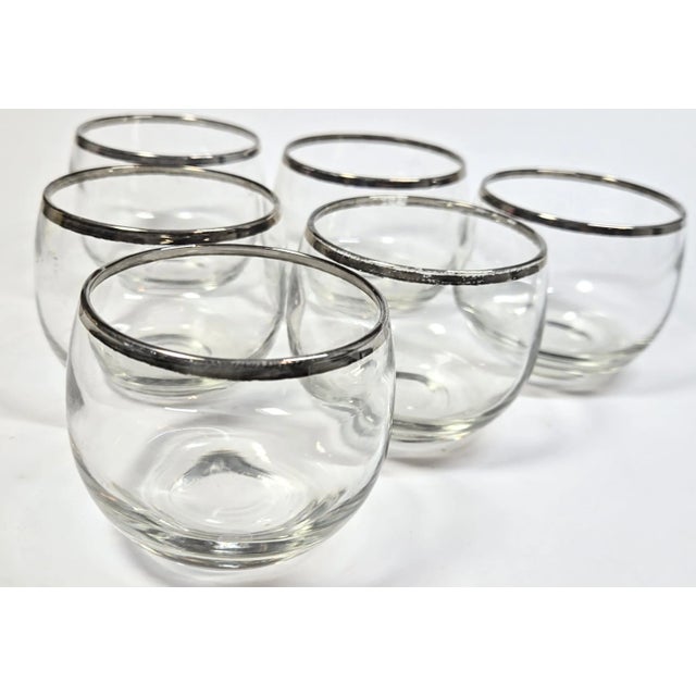 Six sweet mid century roly polies with Dorothy Thorpe style silver trim, coming up! Ready for cocktail hour or display at...