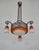 Hippolyte Fournet & Charles Schneider A French art deco chandelier made circa 1925-1930. Done in wrought iron and glass...