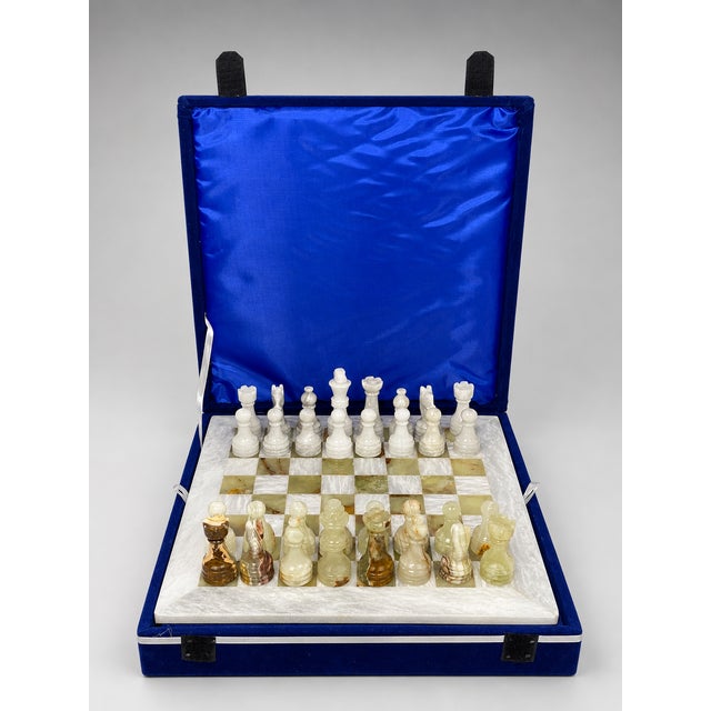 Elevate your game collection and home décor with this exquisite 12" Marble and Onyx Chess Set, beautifully handcrafted...