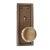 Brass Corbin door knob set with two plain round door knobs and back plates with keyholes. The door plates are inscribed...