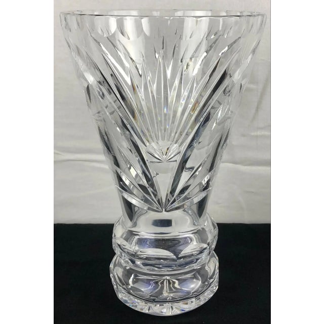 A fine French hand-cut crystal vase that varies with a simple design to extraordinary details. Delightfully heavy, very...