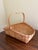 A beautifully handwoven late 20th century split oak basket with generous scale and a wonderfully time-softened surface....