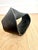 Striking hand-cast metal (iron or steel) Möbius ring sculpture with a continuous single-surface form, finished in a matte...