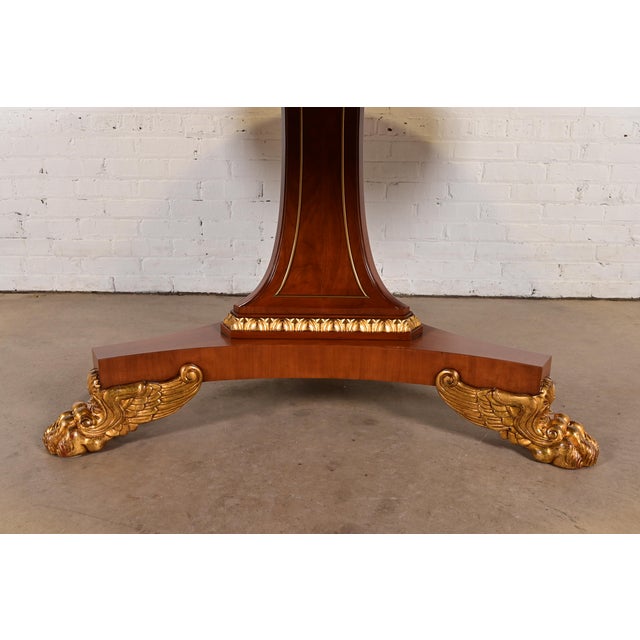 1980s Baker Furniture Regency Cherry Wood and Parcel Gilt Paw Foot Pedestal Extension Dining Table, Newly Refinished For Sale - Image 11 of 14