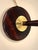 A "Mazda" style Art Deco table lamp, dating from the 1930s, with a tapered, conical stem in faux wood with a dark mahogany...