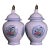 Pair of Chinese White Glazed Porcelain Jars With Floral Panels & Gilt Finials For Sale