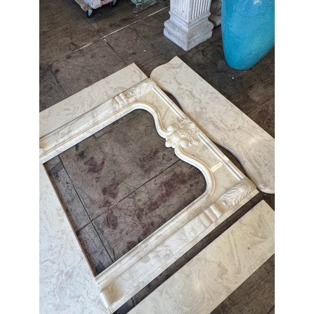 Transform your living space with the exquisite Louis XIV Style Engineered Marble Fireplace, meticulously crafted to embody...