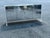 Beautiful Milo Baughman Style Lucite and mirrored chrome tall credenza that stands on three thick Lucite slabs in good...